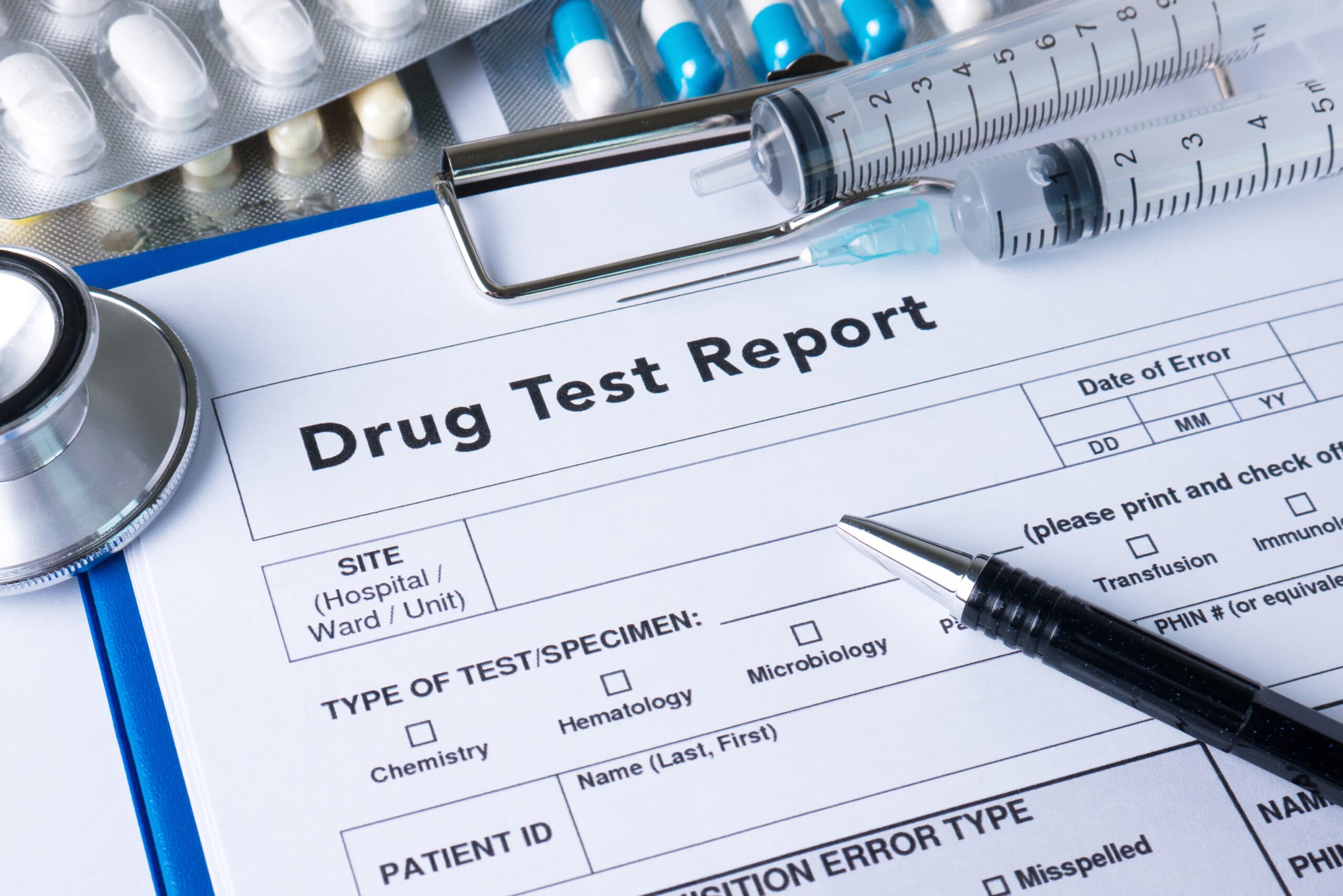 DOT drug test chain-of-custody form with specimen collection supplies
